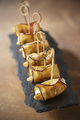 Recette : Rouls d'aubergine aux mini quenelles  poler, noix, coriandre et fromage frais