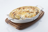 Recette : Gratin de quenelles volaille, bchamel aux cpes et mont d'or